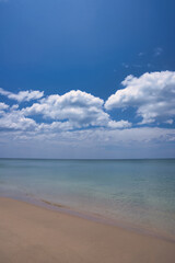 Fototapeta na wymiar Sand beach with turquoise water and beautiful clouds in the sky - Thailand Koh Lanta