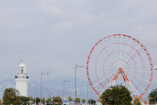  Ferris wheel and lighthouse on the embankment of Batumi, Georgia