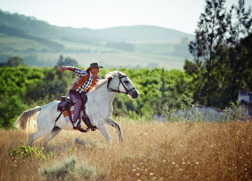 Yeeha. A cowboy on his horse.