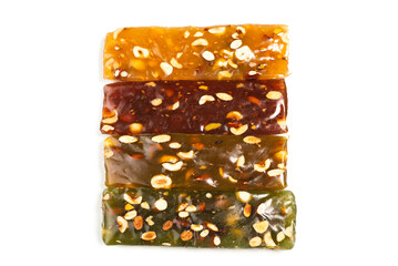 Turkish traditional delight with nuts isolated on white background.