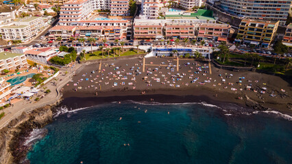 La Arena beach in Tenerife is extremely popular with tourists and locals alike. The peaceful surroundings make it ideal for the whole family