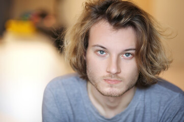 portrait of a young attractive man looking at the camera