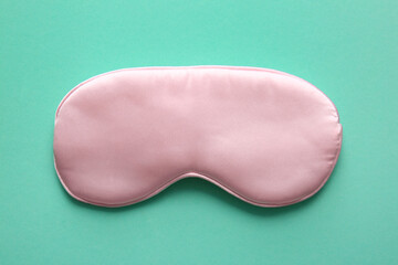 Sleep mask on green background