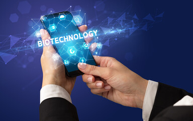 Obraz premium Hand using smartphone with technology concept