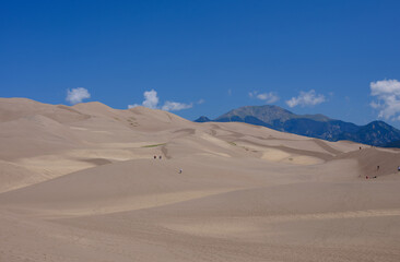 Fototapeta na wymiar Tourists on the Great Sand Dunes in Colorado