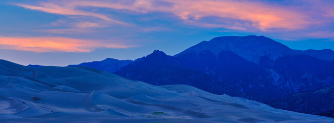 Panoramic image of large sand dunes at sunset and dusk on Colorado © Jorge Moro