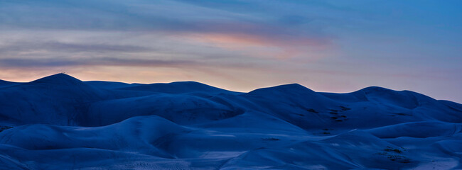 Panoramic image of the great sand dunes near the San Juan Mountains of Colorado
