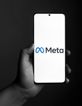 USA - March 13, 2022 :   Meta the new facebook name logo on phone screen stock image.