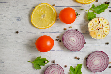 onion, spices, garlic on the old background