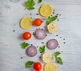 onion, spices, garlic on the old background