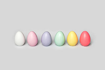 Colorful eggs on white background. Creative Easter concept.