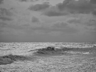 Black and white image of large waves on the Outer banks of a North Carolina Beach