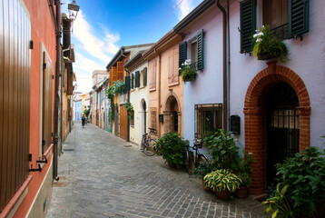 A picturesque narrow street in the ancient district of San Giuliano, Rimini, Italy