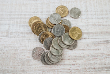 American coins on a wooden background.