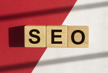 SEO acronym. Search engine optimization word on cubes. photo