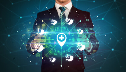 Hand holding healthcare icons concept