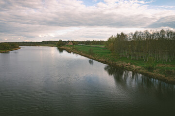 Fototapeta na wymiar landscape with river Lielupe near Jelgava town, Latvia in spring evening