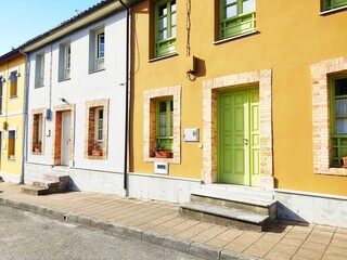 Fototapeta na wymiar Streer view of Colorful houses in row 
