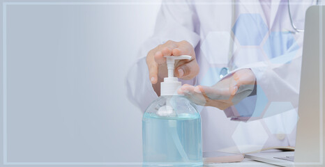 COVID-19'The doctor is washing his hands with alcohol gel.