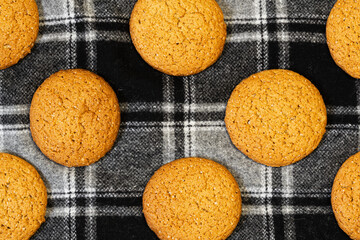Geometric pattern of round oatmeal cookies for background