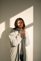 girl in a gray coat stands with his back
portrait young beautiful brunette standing sunlight long straight hair eyes brown long eyelashes girl smiling dreams
