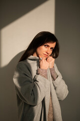 girl in a gray coat stands with his back
portrait young beautiful brunette standing sunlight long straight hair eyes brown long eyelashes girl smiling dreams
