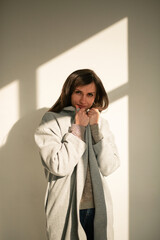 girl in a gray coat stands with his back
portrait young beautiful brunette standing sunlight long straight hair eyes brown long eyelashes girl smiling dreams
