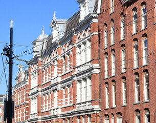 Obraz premium Amsterdam Marnixstraat Street View with Brick Building Facades Close Up, Netherlands