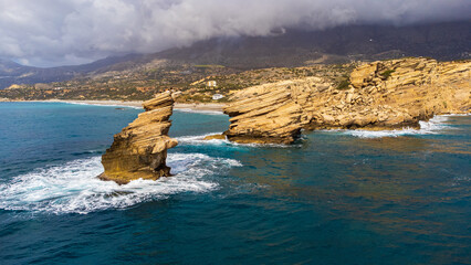 Fototapeta premium aerial shot of the scenic coastline of the Triopetra beach in Crete, Greece