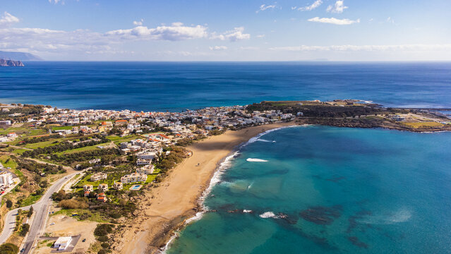 Scenic aerial shot of Paleochora and the coastline with the white mountains in crete, Greece