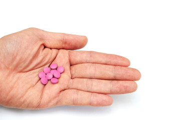 Hand holded medical pills before  oral take in medical healthcare consumption concept