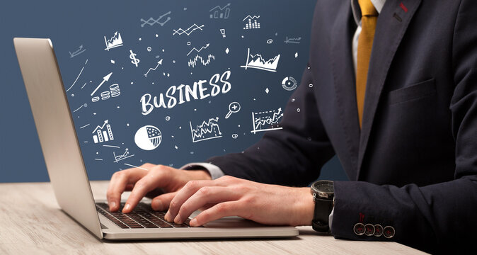 Businessman working on laptop, business concept