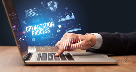 Businessman working on laptop, business concept