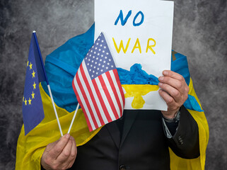 patriot of ukraine stands with inscriptions Stop Putin, Stop the War Stop Fascism