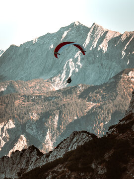 Paraglider over the Bavarian Alps, Germany.