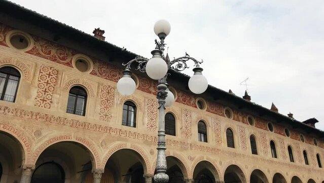 Europe, Italy , Vigevano, Lombardy  March 2022 - The Piazza Ducale of Vigevano is a large Renaissance-style square. Founded in  1492 at the behest of Ludovico il Moro , Sant'Ambrogio Cathedral
