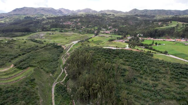 Aerial view of Cusco, Peru hillside of Sacsayhuaman and Cristo Blanco statue towering above the city
