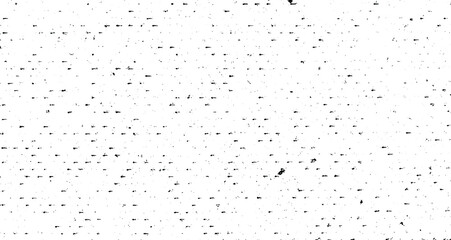 Small uneven spots and particles of debris. Abstract vector texture. Distressed uneven background. Grunge texture overlay with fine grains isolated on white background. Vector illustration. EPS10.