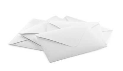 Heap of paper envelopes on white background