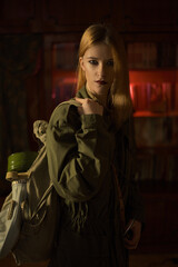 military girl in a gas mask against radiation