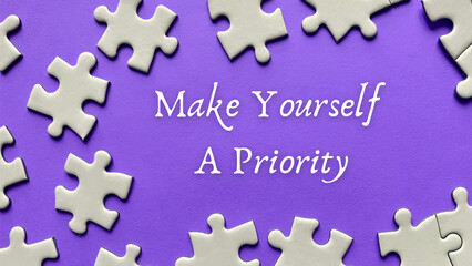 Motivational and inspirational quote on missing jigsaw puzzle - Make yourself a priority.