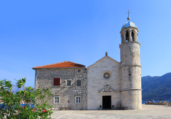 Fototapeta na wymiar Church of Madonna on the reef on the island near Perast in Montenegro