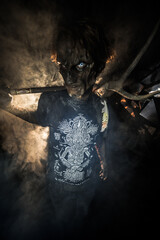 scary sorcerer in smoke. voodoo rite