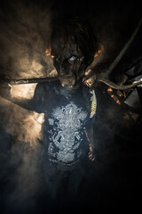 scary sorcerer in smoke. voodoo rite
