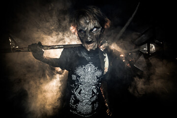 scary sorcerer in smoke. voodoo rite