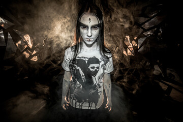 the sorceress stands in the smoke. voodoo rite