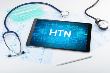 Close-up view of a tablet pc with medical abbreviation