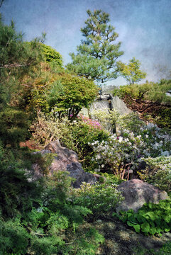 Artistic painterly relaxation garden scene with waterfall, intended for portrait background but also works well as a standalone image.