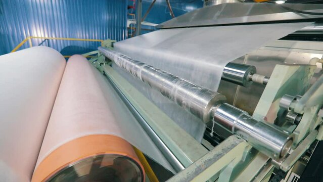 Modern conveyor line for the production of synthetic winterizer. Nonwoven fabric manufacturing process