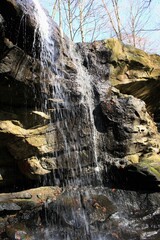 Waterfall spray on rocks.